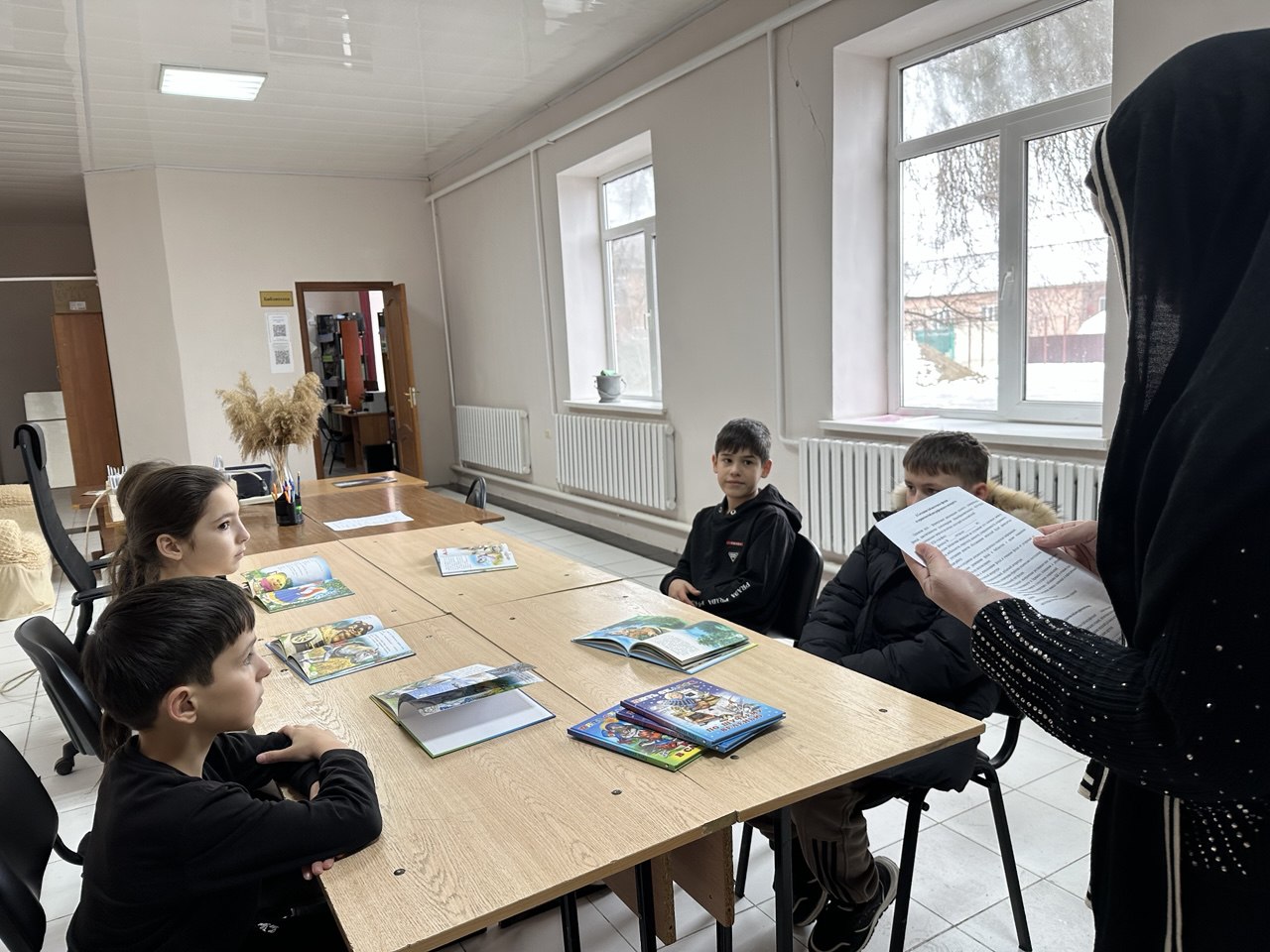 Библиотечный урок «В мире книг»